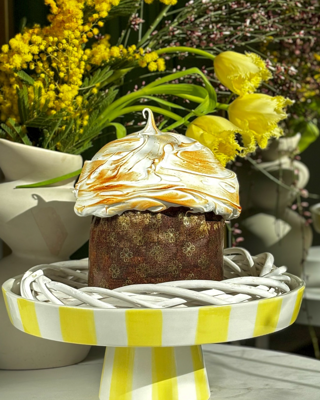 Tres Leches Easter Cake with Condensed Milk Cream. Soft sponge cake soaked in three milks and topped with toasted meringue