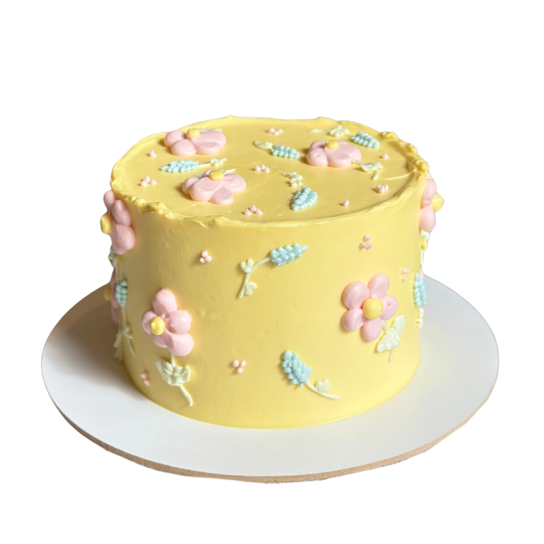 Pastel Yellow Cake with Buttercream Flowers