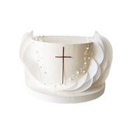 Tall white cake decorated with a thin gold cross topper and large white edible wafer petals on the sides. 