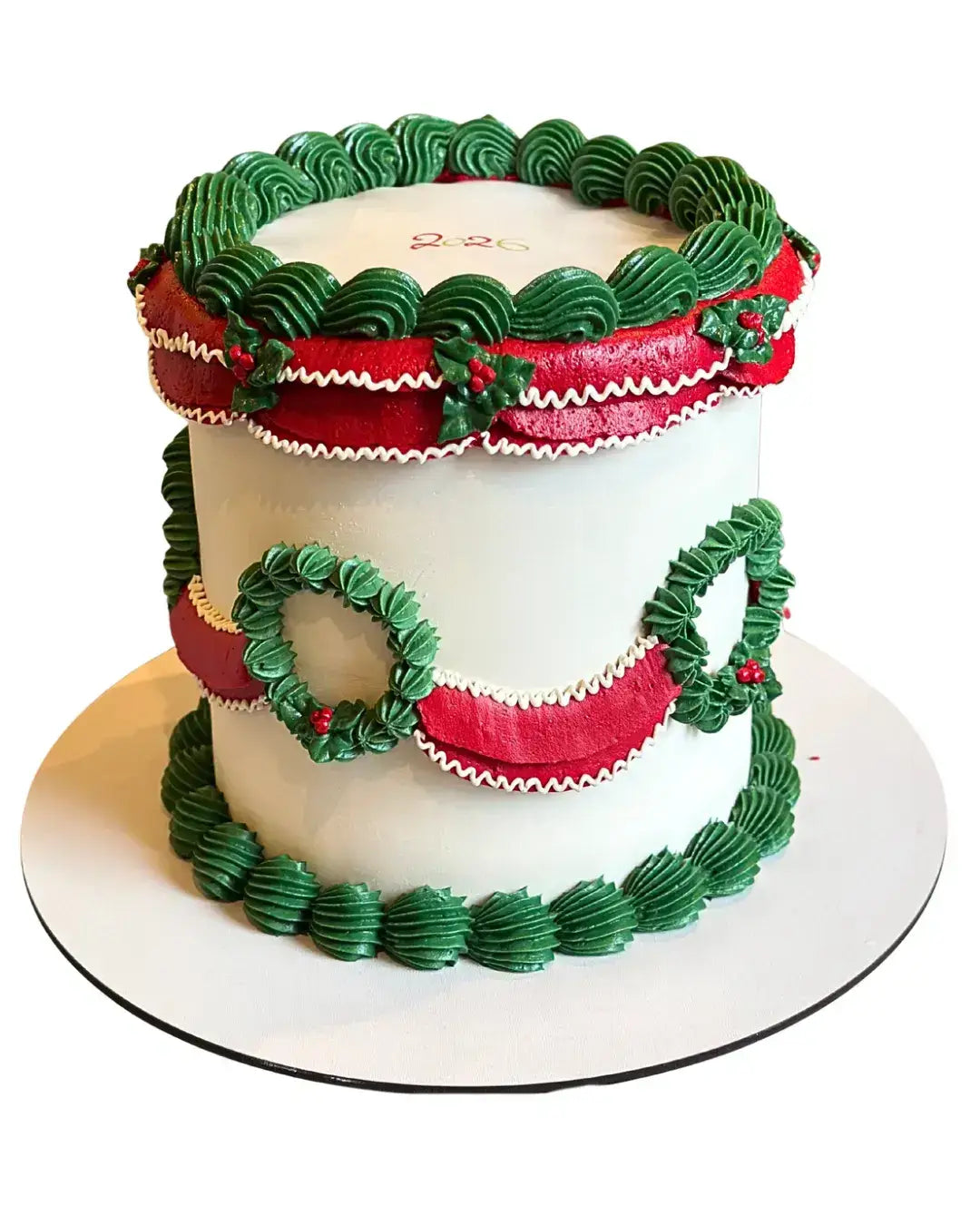 decorated Lambeth celebration cake with ornate buttercream borders and traditional holiday ornament details