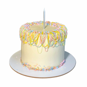 Clean white cylinder cake decorated with multi-sized white sugar pearls and a single fresh pink rose on top by Dessert Boutique.