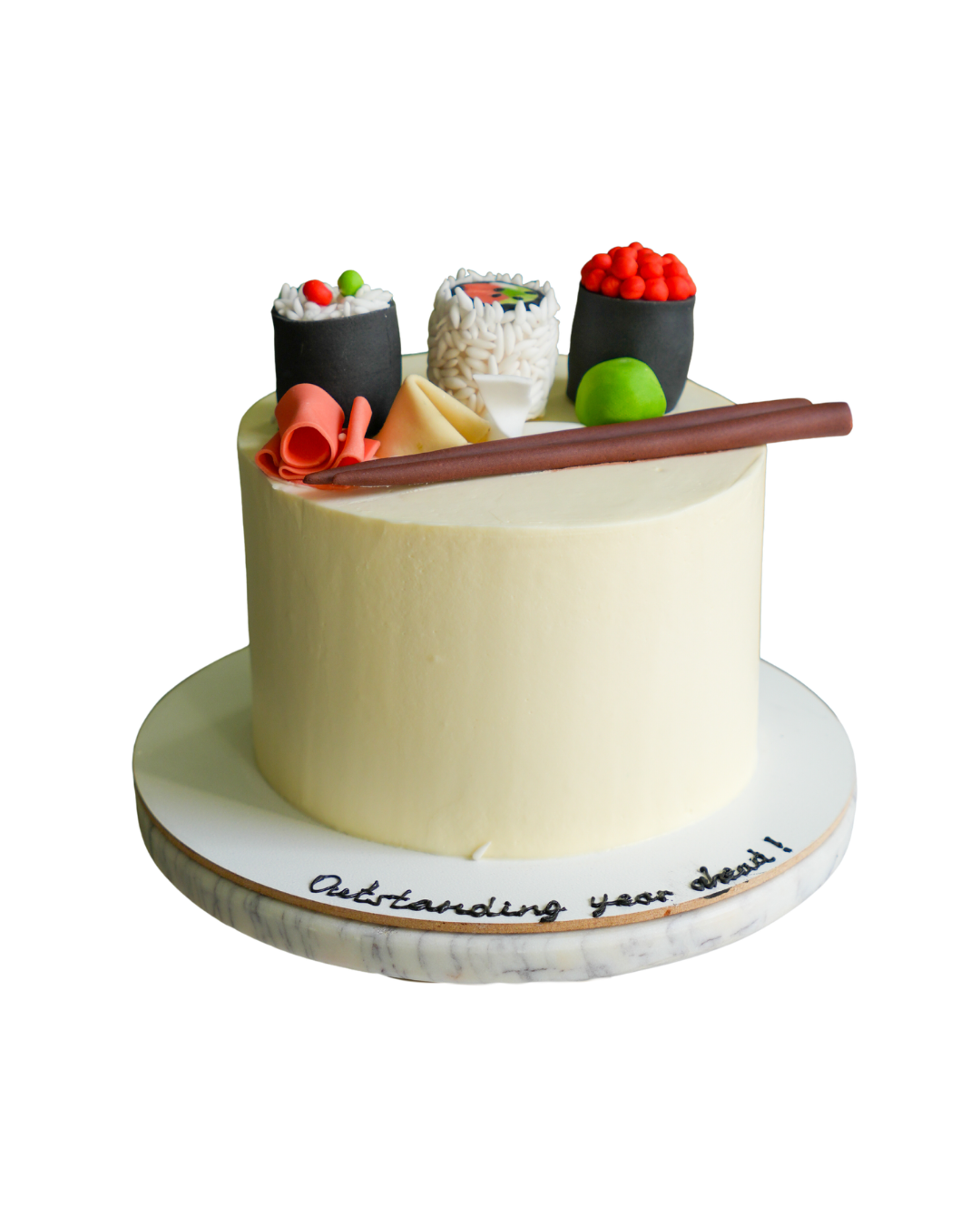 Minimalist cream colored cake topped with edible sugar sushi replicas, red caviar gunkan, wasabi paste and chopsticks by Dessert Boutique.