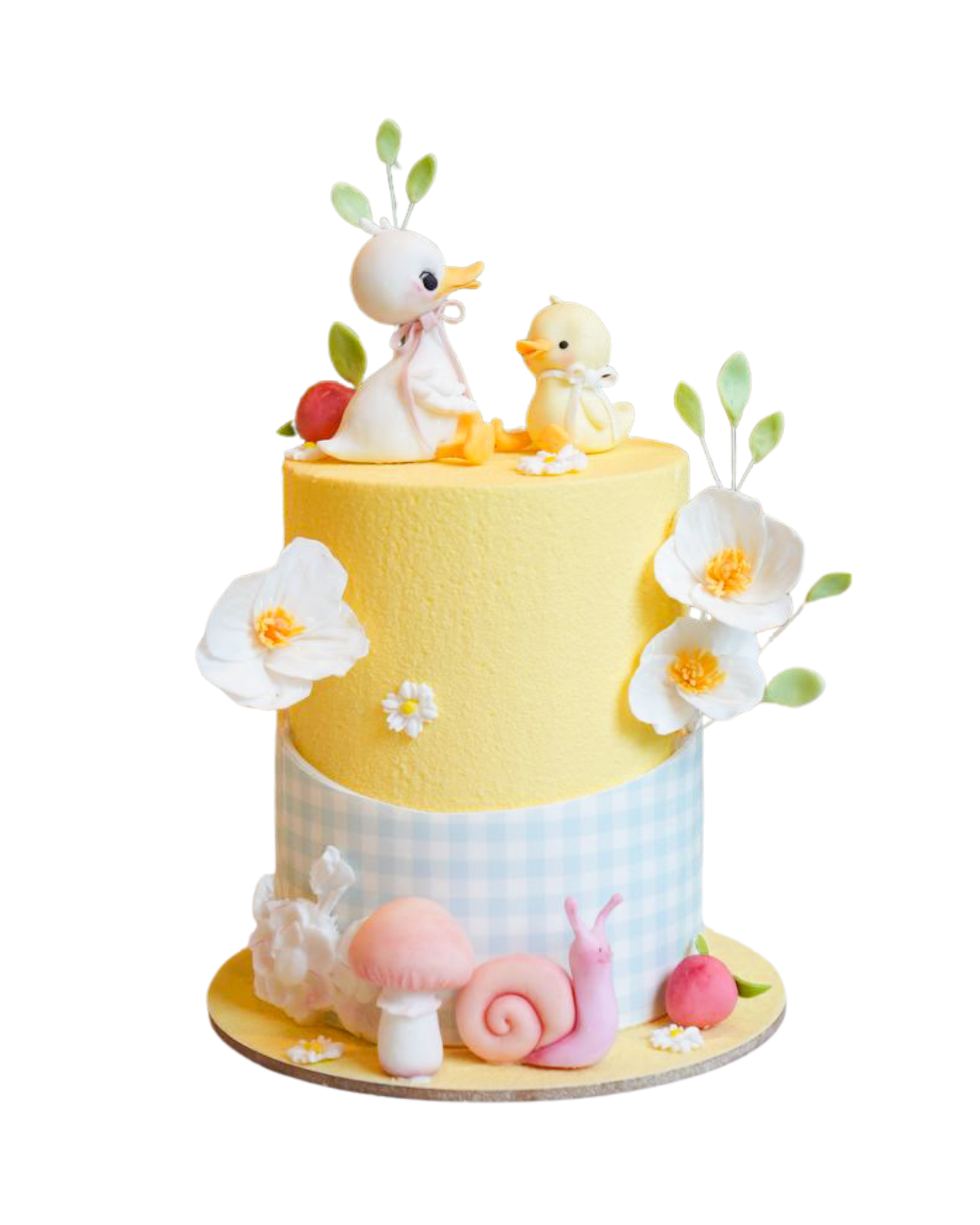 Two tiered birthday cake featuring a yellow top, blue checkered bottom tier, sweet sugar ducks and a pink snail by Dessert Boutique.